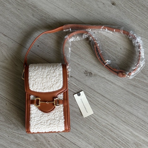 Anthropologie Sherpa Cell Crossbody Bag with a sherpa and faux leather exterior - Picture 2 of 5